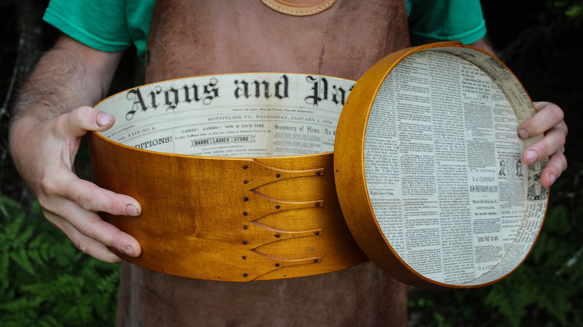 A size #7 Shaker Oval Box with Vintage Newspaper Lining the Interior.  