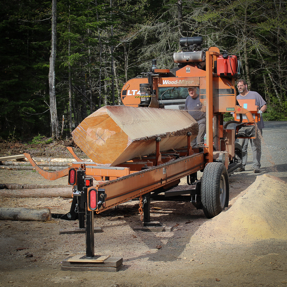 Bandsaw mill sawing lumber for shaker boxes