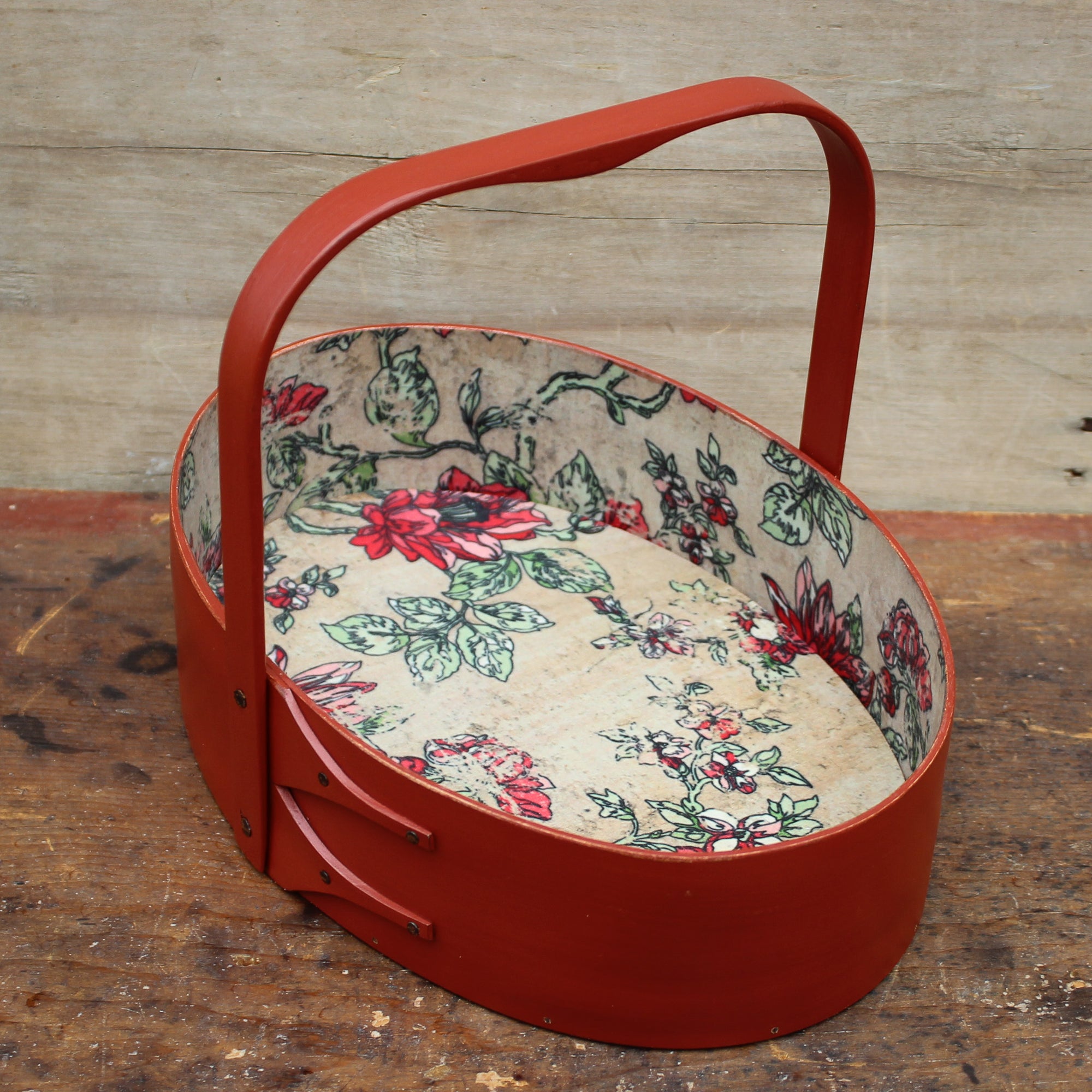 Medium size Shaker sewing carrier with floral papered interior, painted in a rustic red finish.